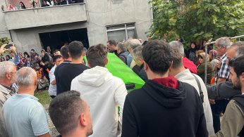 Emekli uzman çavuşun katlettiği eşi ve oğlu toprağa verildi