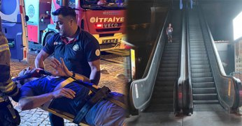 Yürüyen merdivenden kafenin çatısına düştü