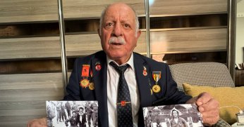 Kore gazisi anılarını  evinde canlı tutuyor