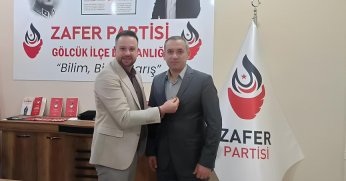 Kayı, yeni üyelere rozetlerini taktı