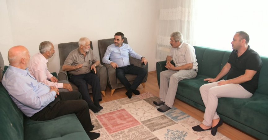 Özlü’den hasta ve yaşlılara ziyaret