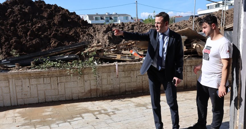 Özlü’den selzede esnafa destek